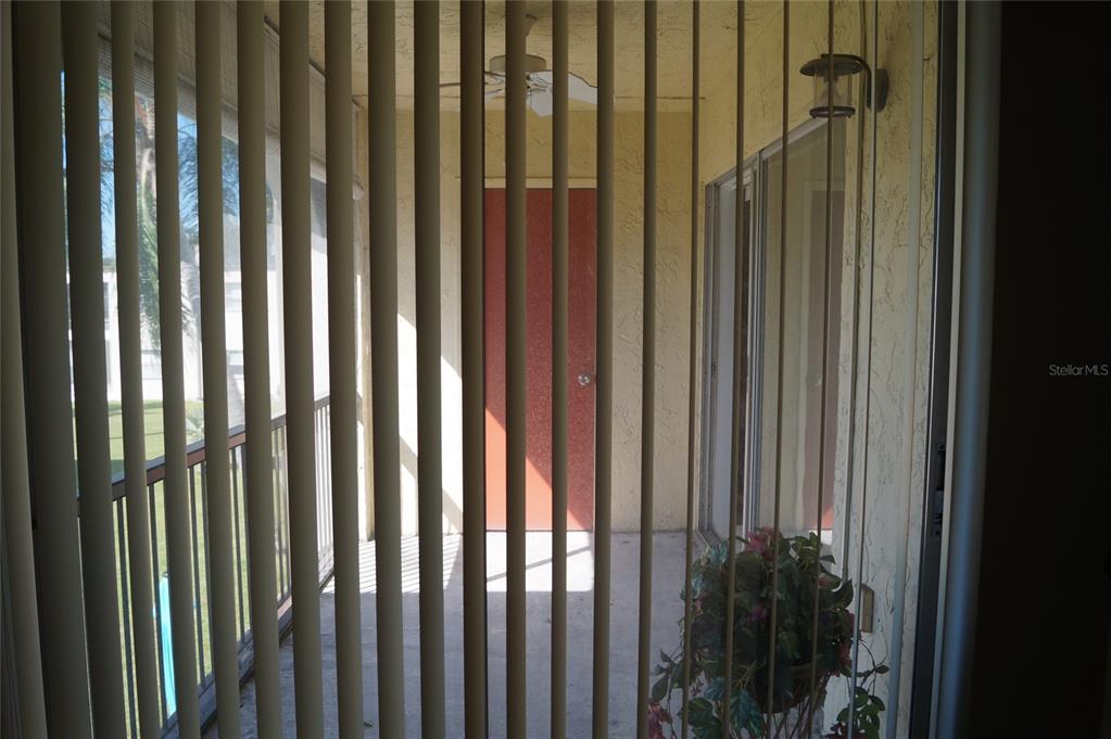 7701 Starkey Road, Unit 408 Seminole, FL 33777 - Photo 28 of 28 a view of a balcony with wooden fence