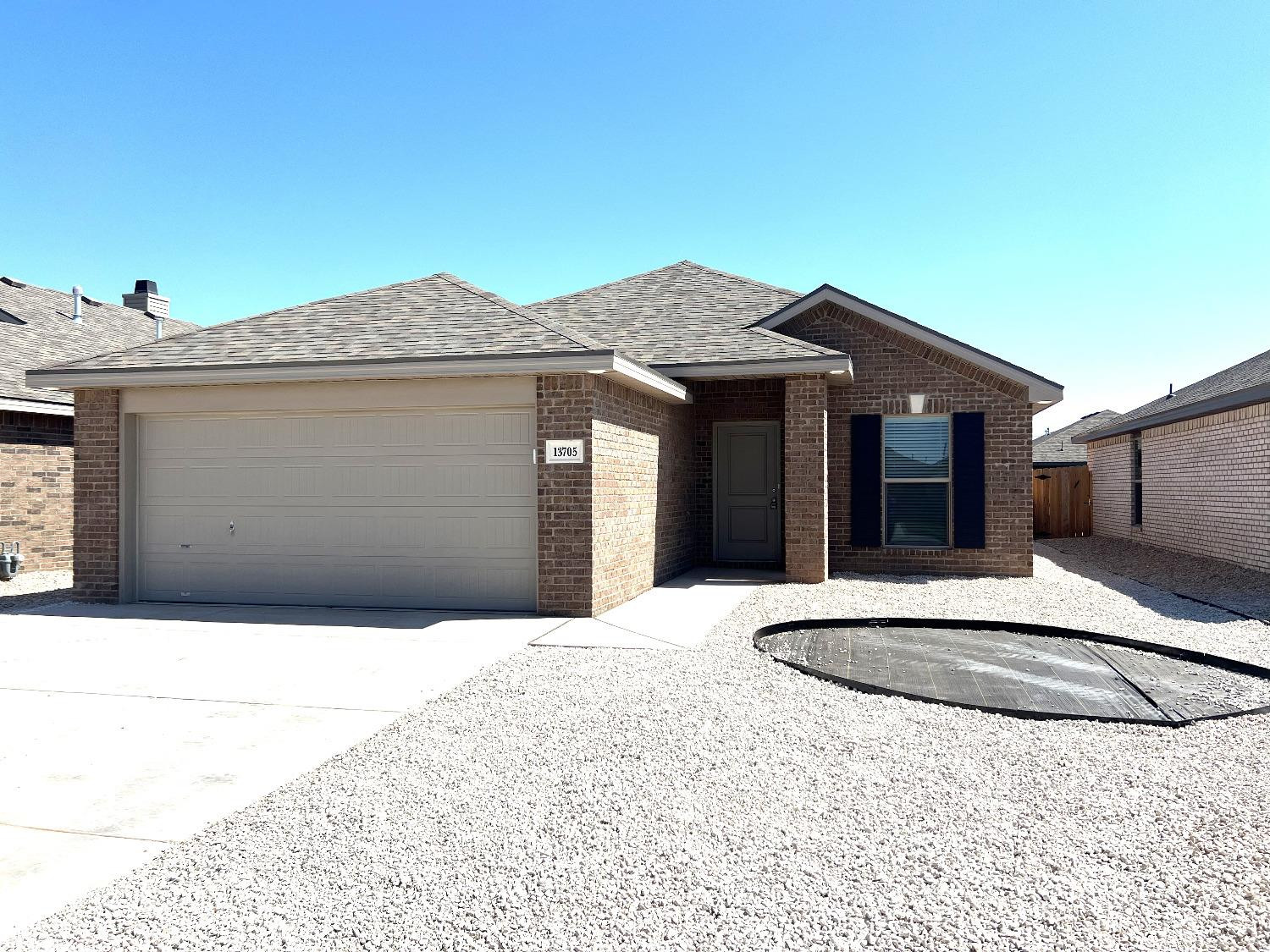 13705 Avenue Q Lubbock, TX 79423 - Photo 1 of 13 a house view with a outdoor space