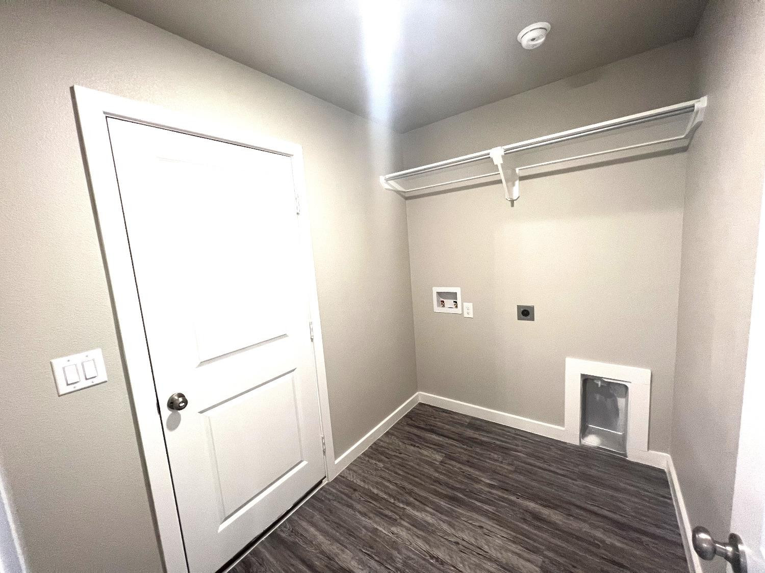 13705 Avenue Q Lubbock, TX 79423 - Photo 4 of 13 a view of empty room with wooden floor