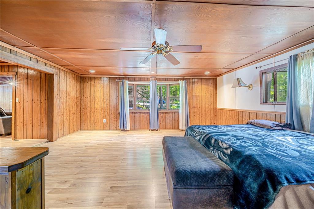218 Horse Shoe Bend Road Acme, PA 15610 - Photo 15 of 31 a bed sitting in a spacious bedroom next to a window