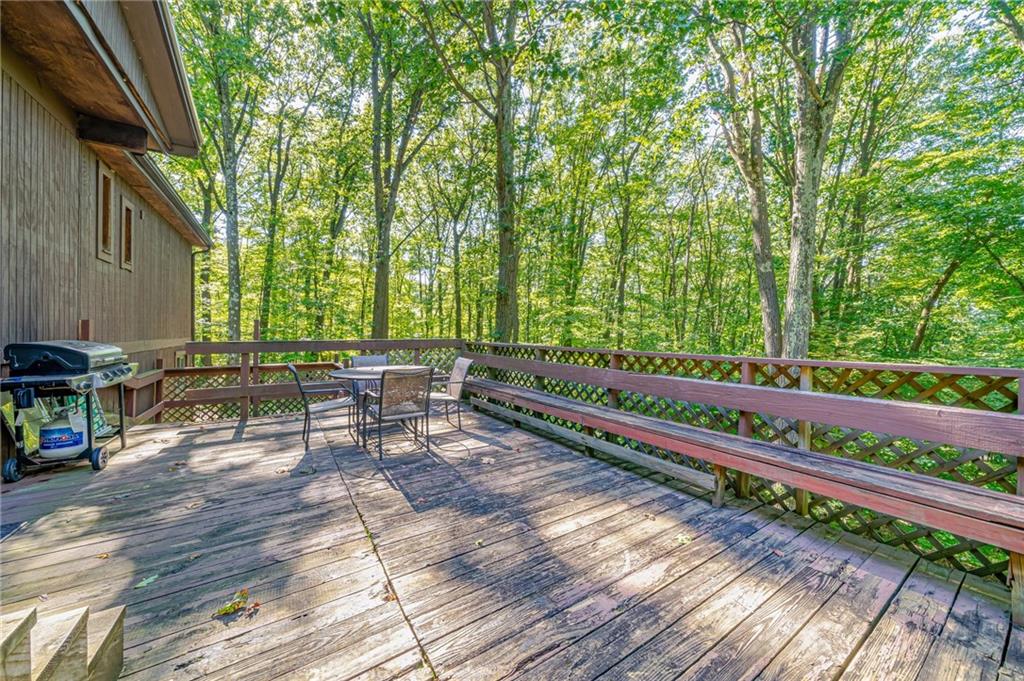 218 Horse Shoe Bend Road Acme, PA 15610 - Photo 20 of 31 a view of a backyard with sitting area