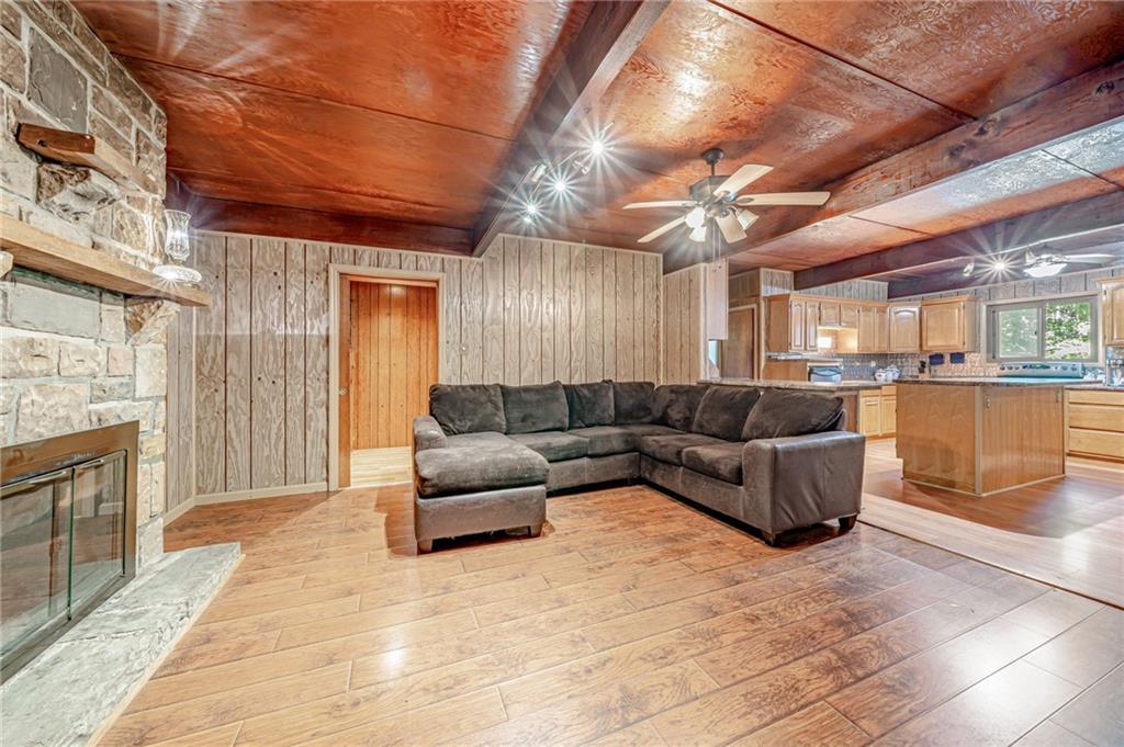 218 Horse Shoe Bend Road Acme, PA 15610 - Photo 8 of 31 a living room with furniture and a fireplace