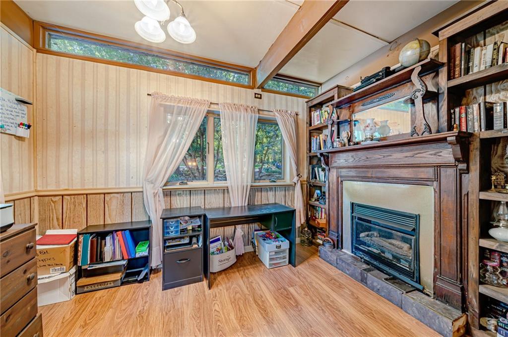 218 Horse Shoe Bend Road Acme, PA 15610 - Photo 10 of 31 a living room with lots of furniture and a fireplace