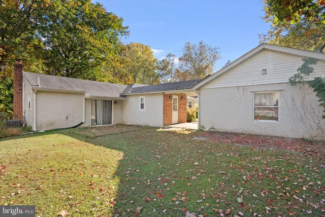 a view of garage and yard