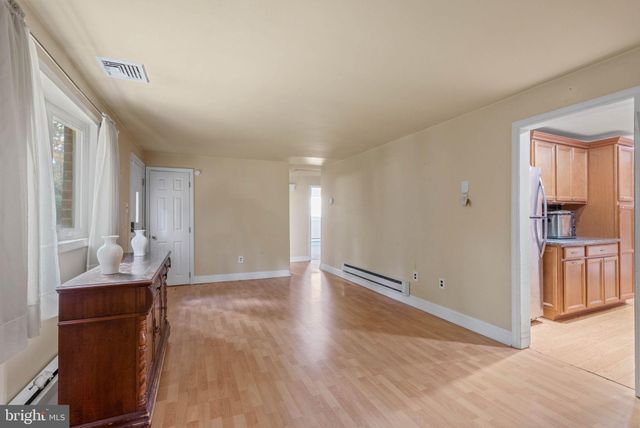 a view of livingroom with furniture and wooden floor