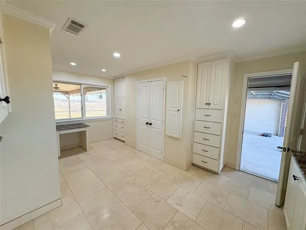 a view of a livingroom with a furniture and window