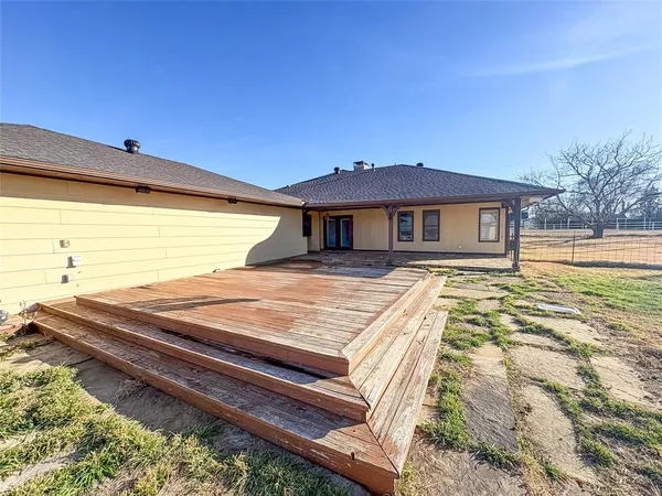 a view of a house with a swimming pool