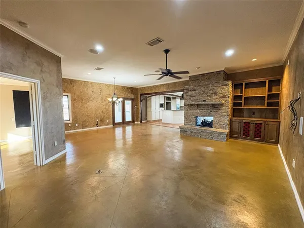a view of a livingroom with furniture and fireplace