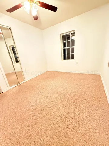 a bathroom with a shower and a toilet