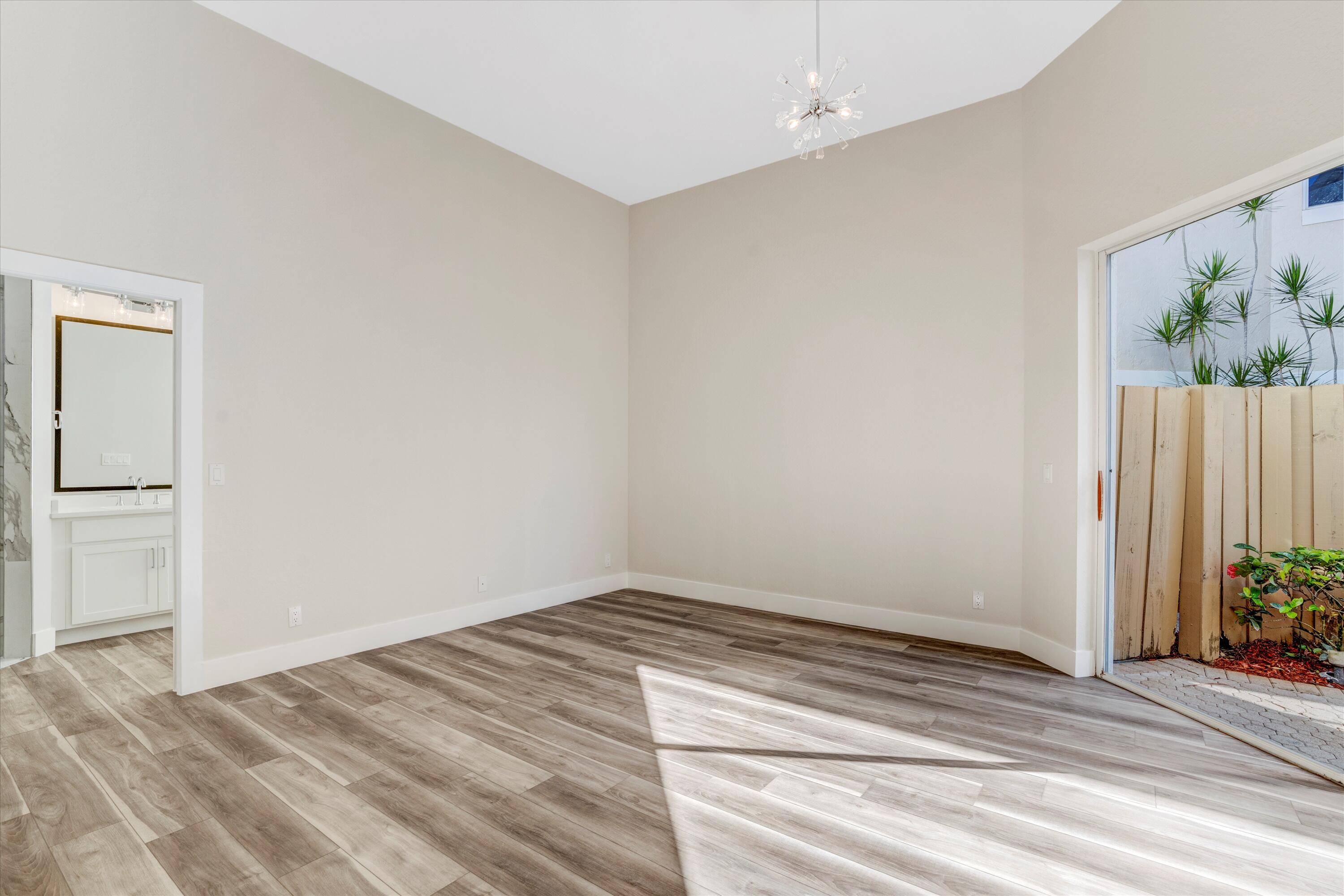 2482 Northwest 67th Street Boca Raton, FL 33496 - Photo 17 of 25 Master Bedroom