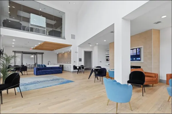 a very nice looking living room with a large window