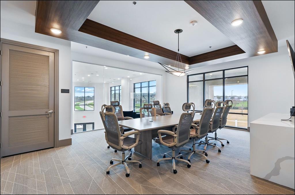 2700 Old Denton Road, Unit 2272 Carrollton, TX 75007 - Photo 29 of 40 a view of a dining room with furniture