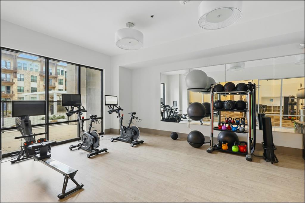 2700 Old Denton Road, Unit 2272 Carrollton, TX 75007 - Photo 32 of 40 a view of a room with gym equipment