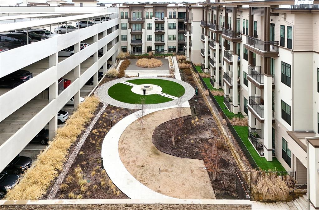 2700 Old Denton Road, Unit 2272 Carrollton, TX 75007 - Photo 33 of 40 a house view with a swimming pool