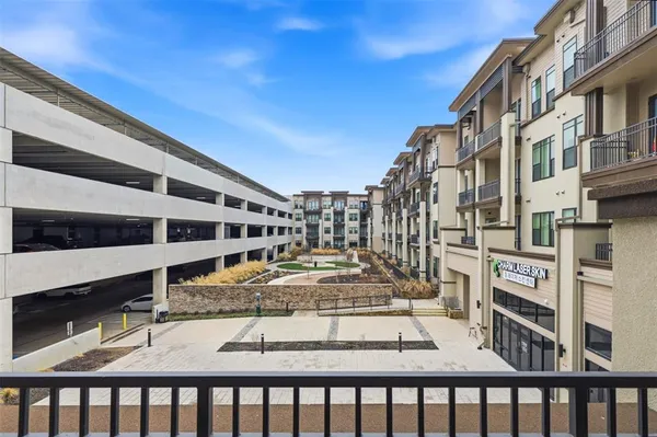 a view of a building from a balcony