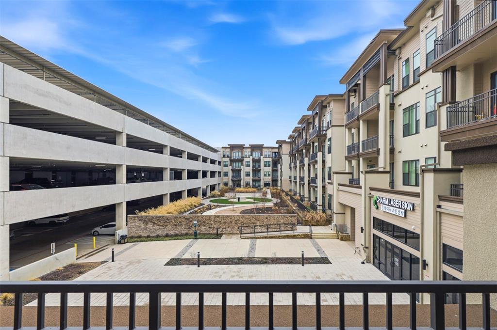 2700 Old Denton Road, Unit 2272 Carrollton, TX 75007 - Photo 9 of 40 a view of a building from a balcony