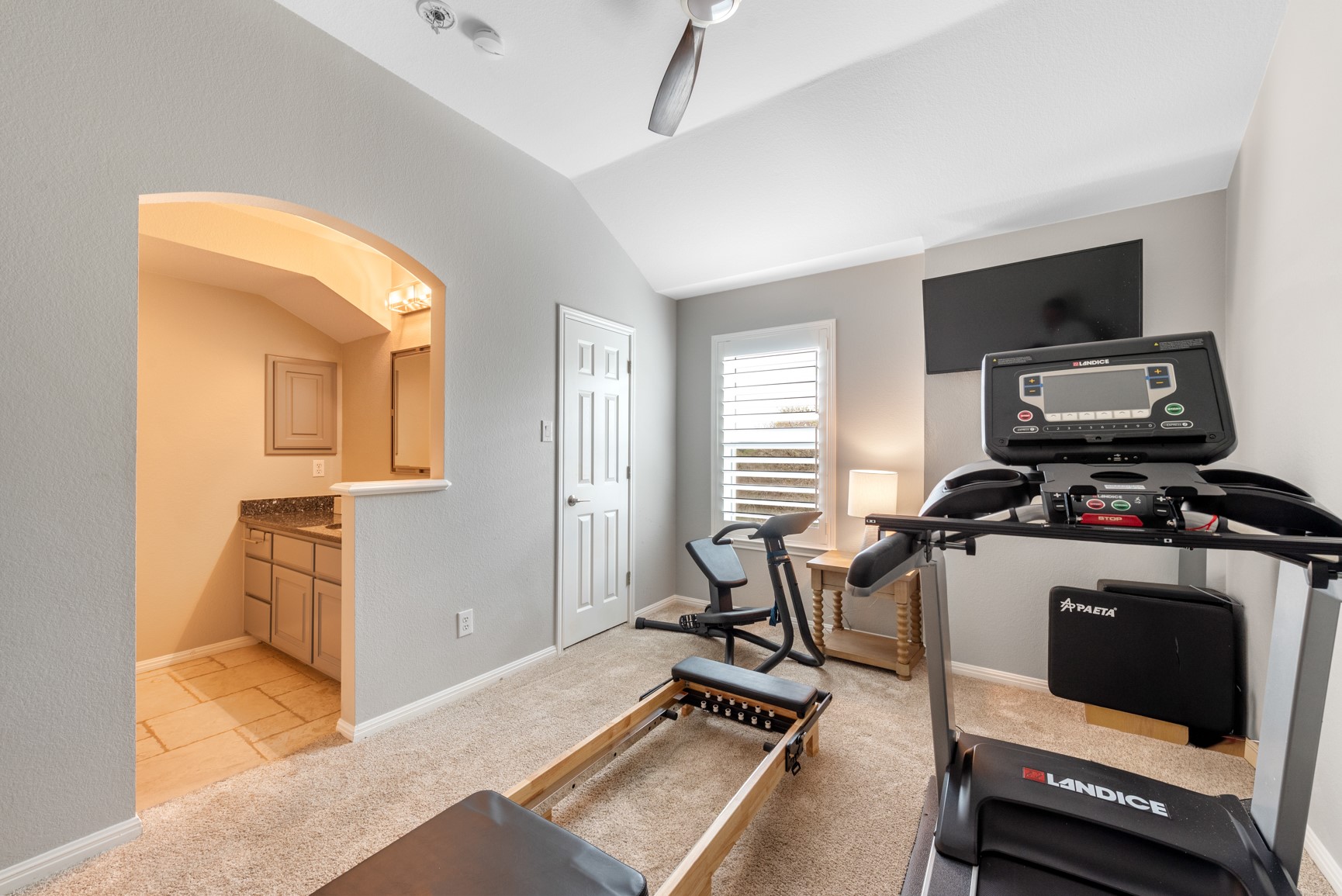 664 Ranchers Club Lane Driftwood, TX 78619 - Photo 19 of 40 a view of a livingroom with workspace and a window