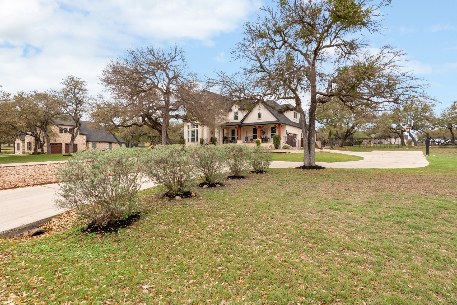 664 Ranchers Club Lane Driftwood, TX 78619 - Photo 25 of 40 a view of yard with tree