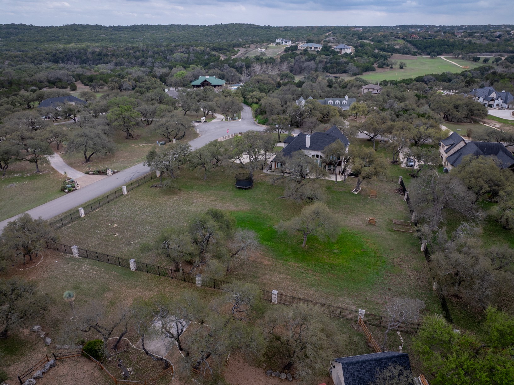 664 Ranchers Club Lane Driftwood, TX 78619 - Photo 31 of 40 an aerial view of a house with a yard