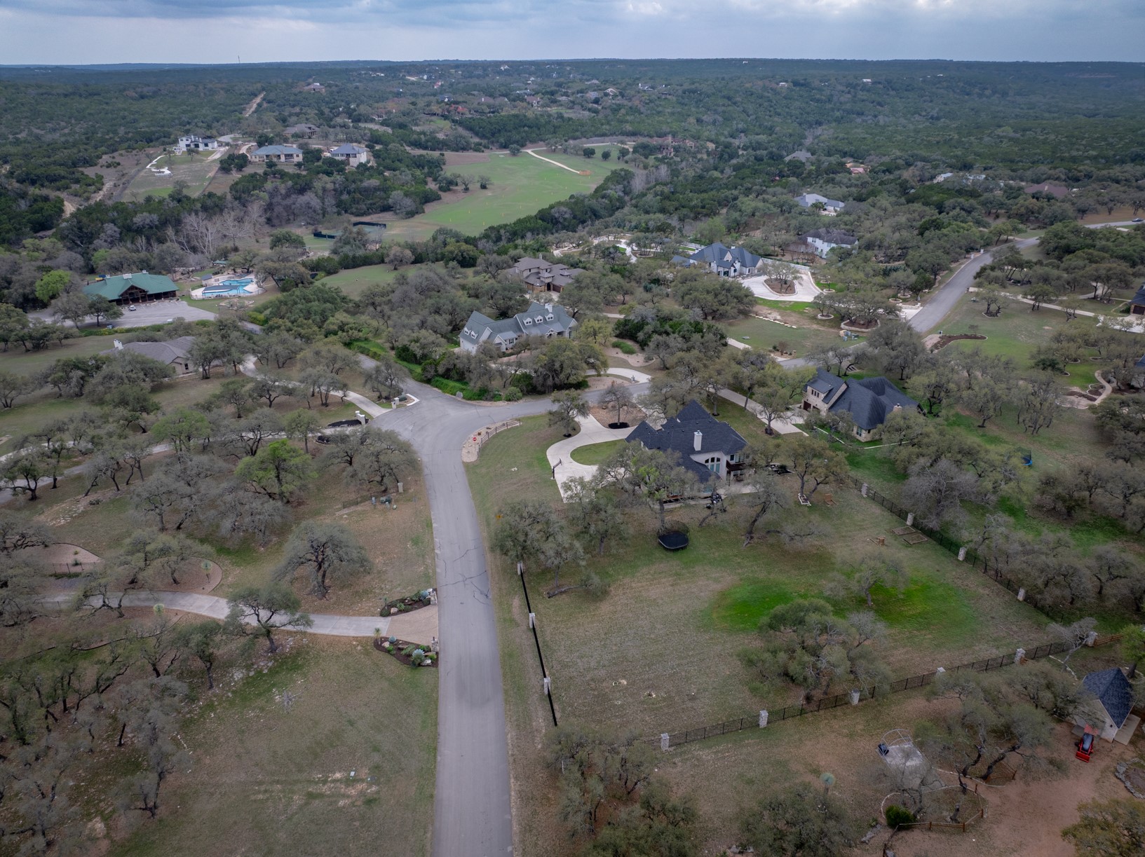 664 Ranchers Club Lane Driftwood, TX 78619 - Photo 33 of 40 an aerial view of a house with a yard