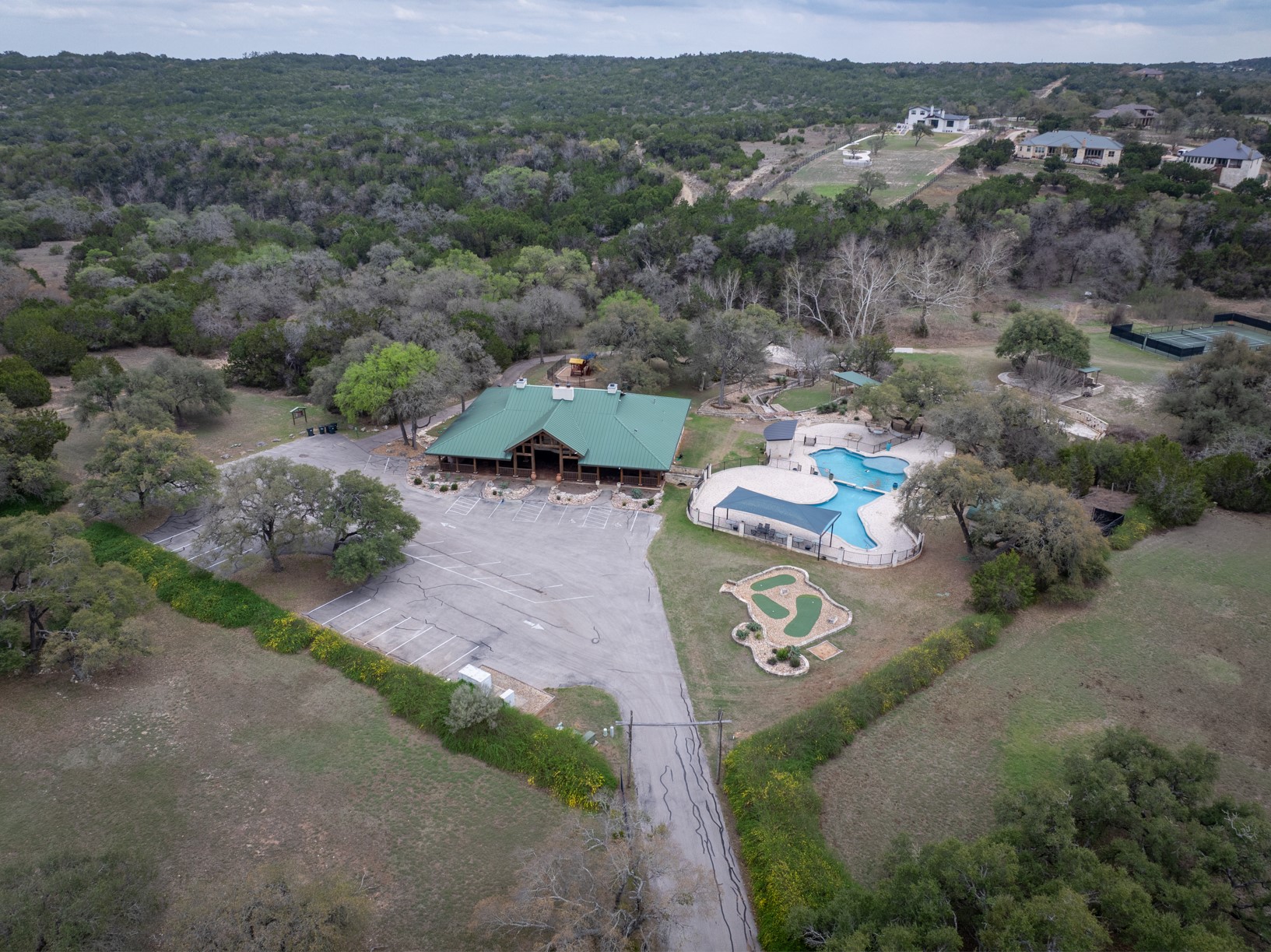 664 Ranchers Club Lane Driftwood, TX 78619 - Photo 34 of 40 an aerial view of a house with a yard
