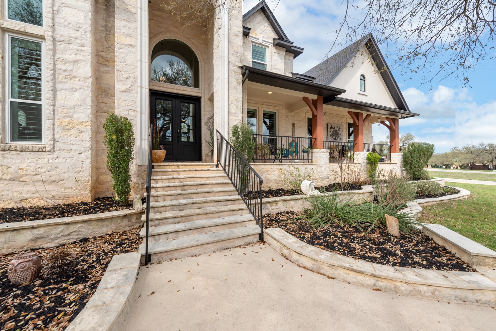 664 Ranchers Club Lane Driftwood, TX 78619 - Photo 40 of 40 a front view of a house with garden