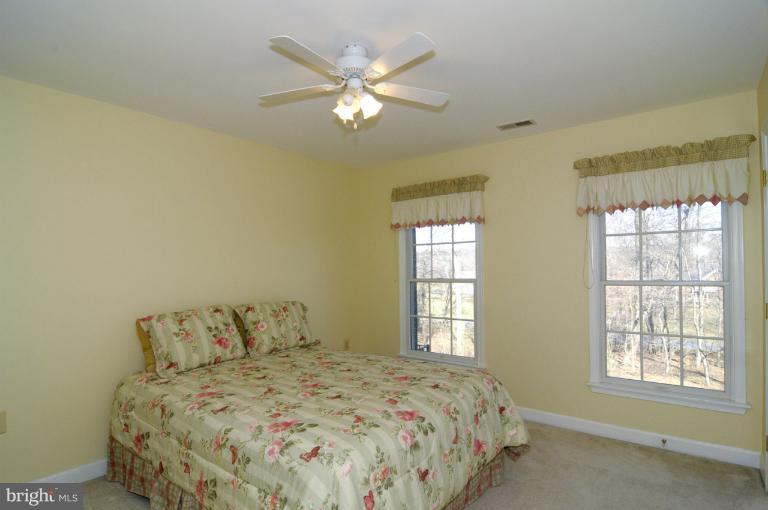 2135 Misty Meadow Road Finksburg, MD 21048 - Photo 12 of 27 a bedroom with a bed and window