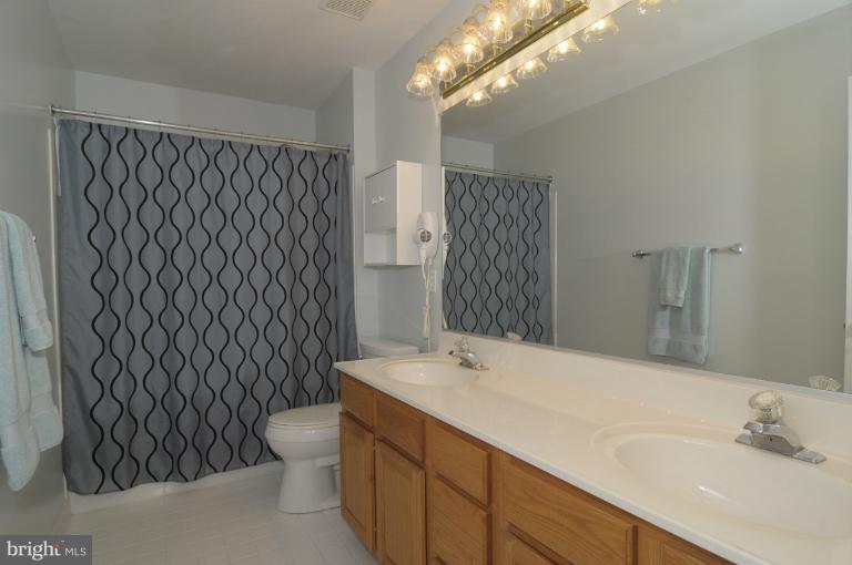 2135 Misty Meadow Road Finksburg, MD 21048 - Photo 19 of 27 a bathroom with a sink and a mirror