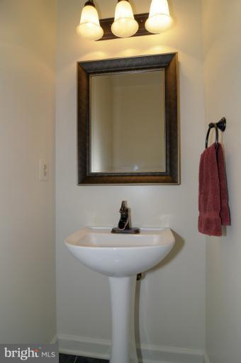 2135 Misty Meadow Road Finksburg, MD 21048 - Photo 24 of 27 a bathroom with a sink and a mirror