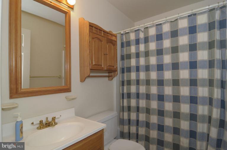 2135 Misty Meadow Road Finksburg, MD 21048 - Photo 6 of 27 a bathroom with a sink toilet and shower