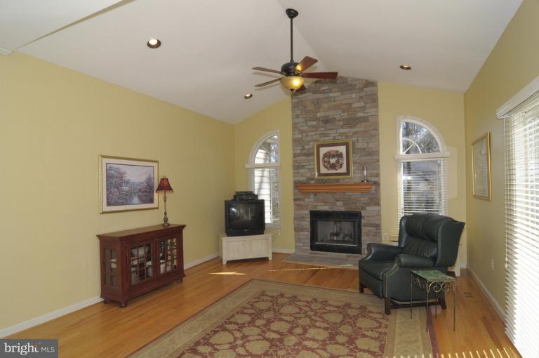 2135 Misty Meadow Road Finksburg, MD 21048 - Photo 7 of 27 a living room with furniture and a fireplace