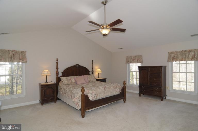 2135 Misty Meadow Road Finksburg, MD 21048 - Photo 8 of 27 a spacious bedroom with a bed and a window