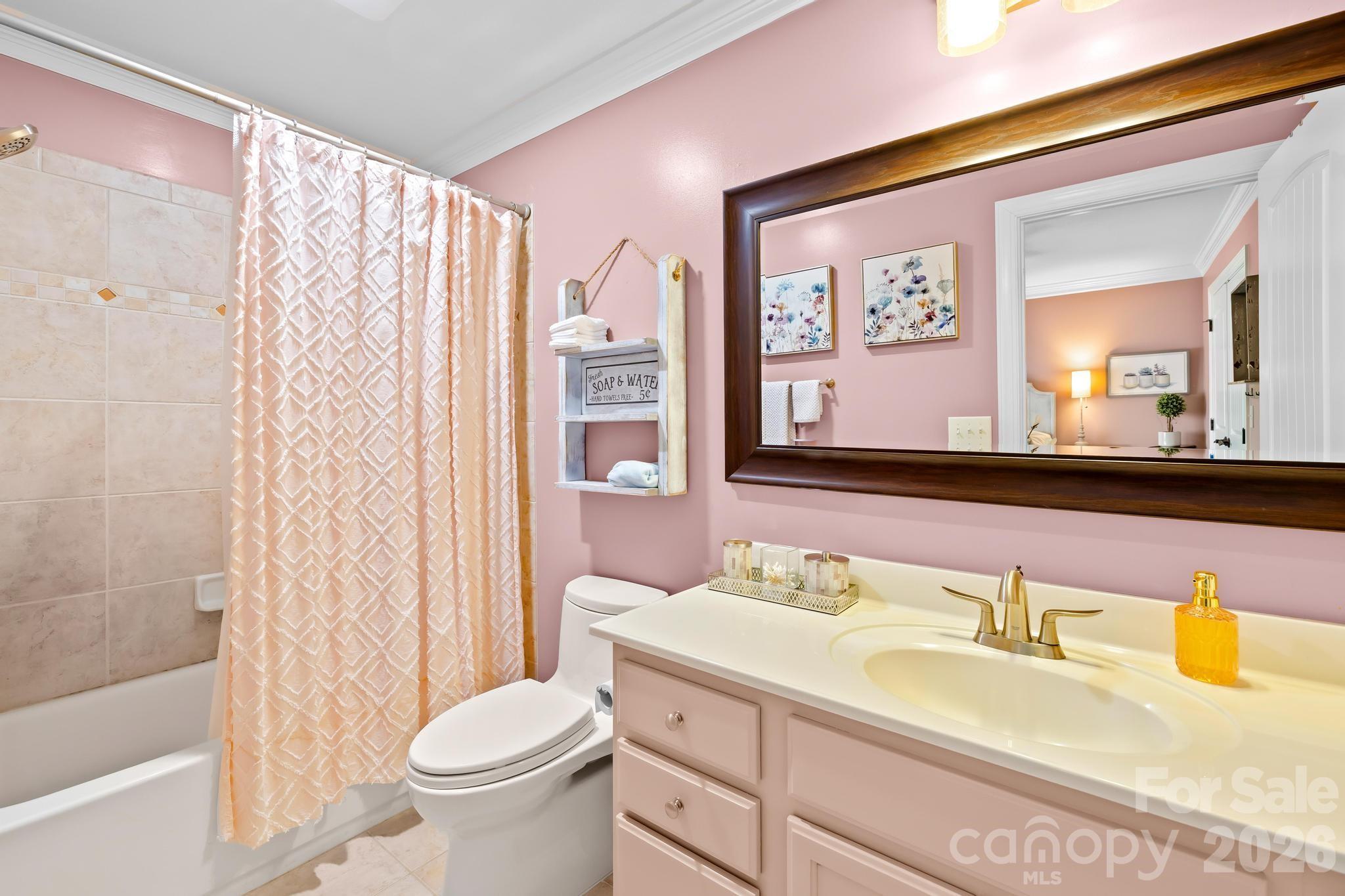 340 Riverwood Road Mooresville, NC 28117 - Photo 27 of 48 a bathroom with a granite countertop sink and a mirror