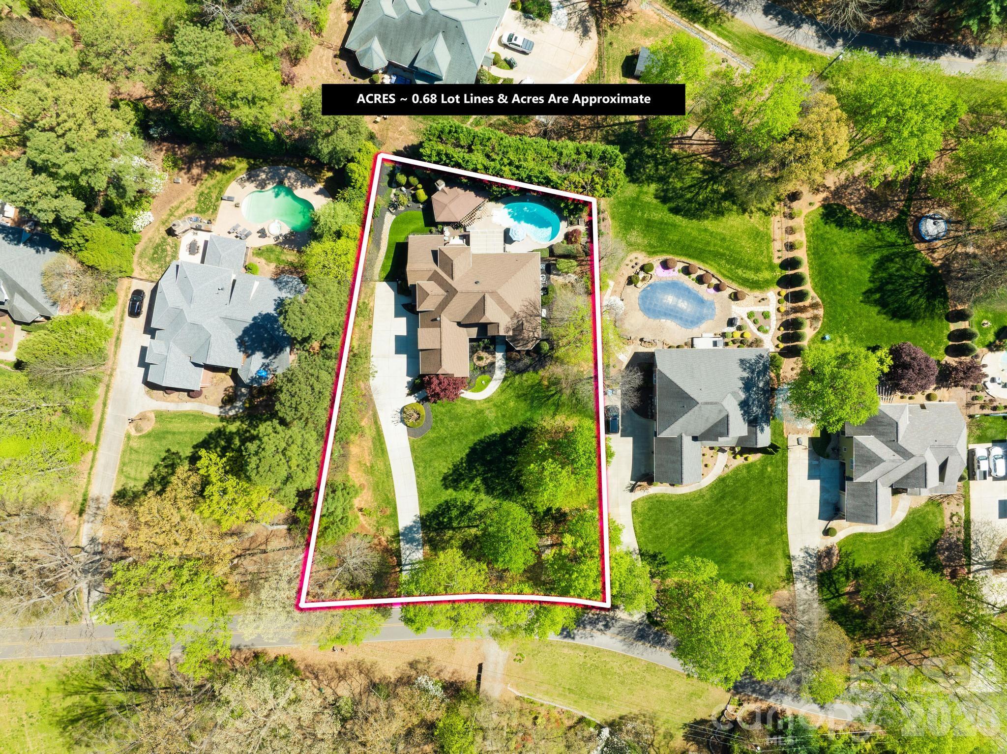 340 Riverwood Road Mooresville, NC 28117 - Photo 4 of 48 an aerial view of a house with a yard