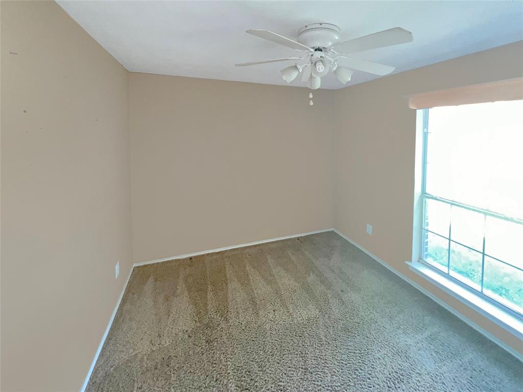 3661 Emo Street Midlothian, TX 76065 - Photo 21 of 24 wooden floor in an empty room with a window