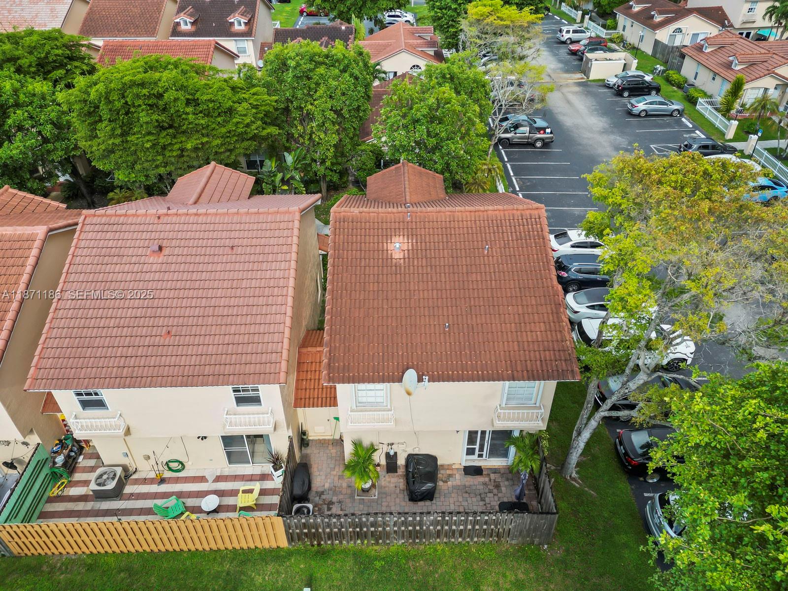 15293 Southwest 111th Street Miami, FL 33196 - Photo 3 of 32 an aerial view of a house