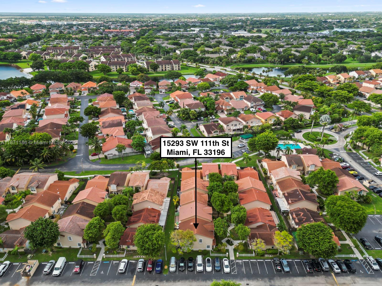 15293 Southwest 111th Street Miami, FL 33196 - Photo 5 of 32 an aerial view of residential houses with outdoor space and street view