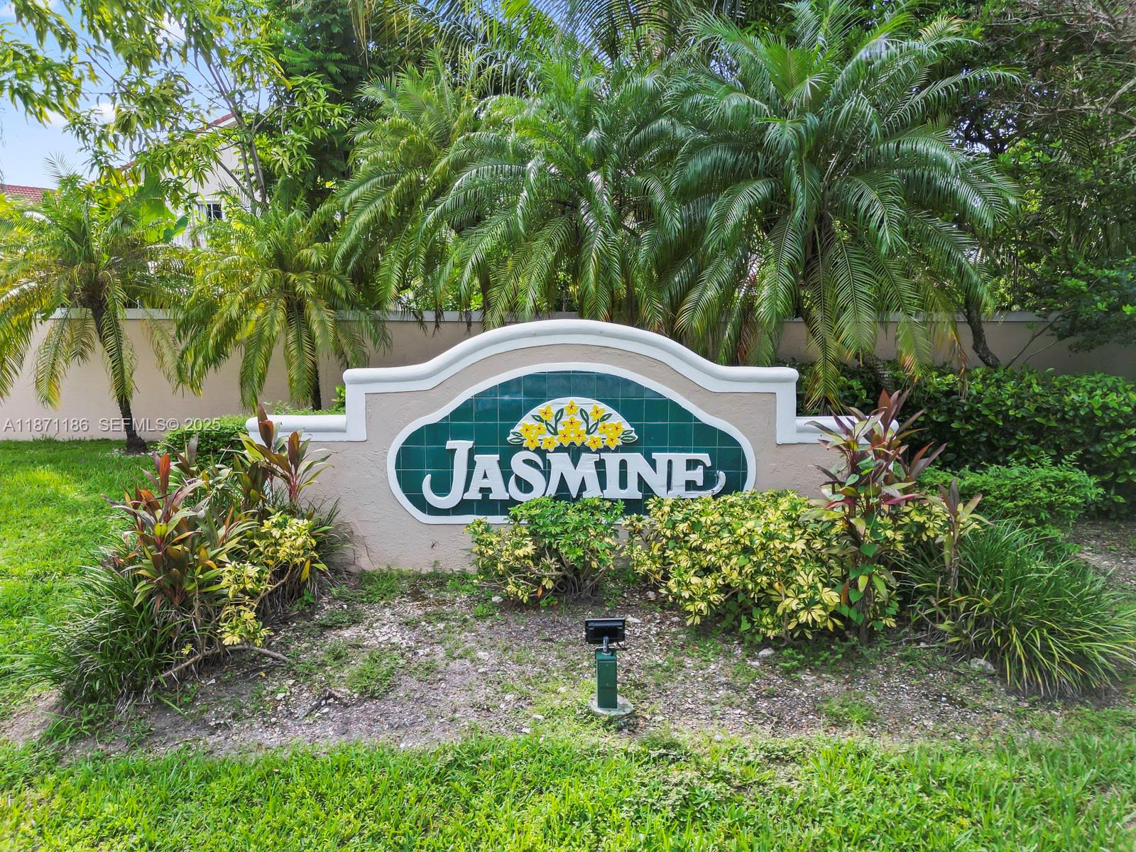 15293 Southwest 111th Street Miami, FL 33196 - Photo 7 of 32 a sign that is on a tree