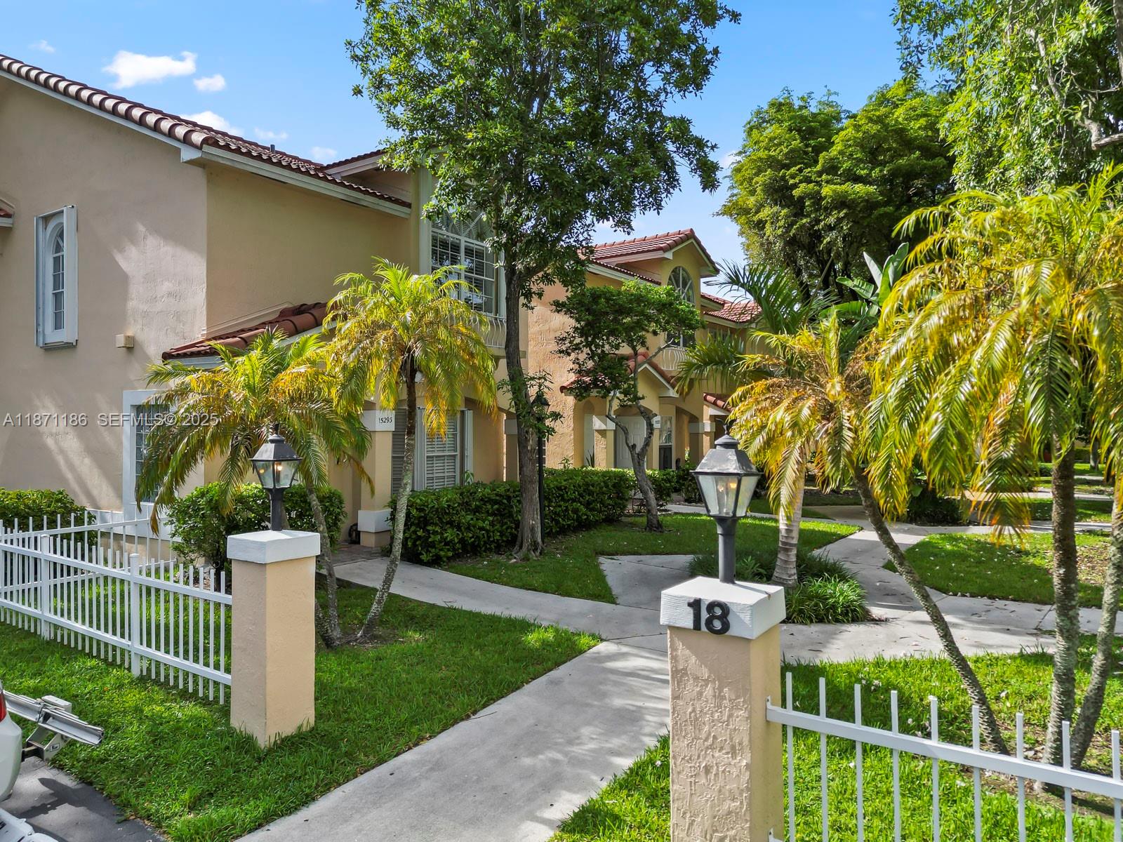 15293 Southwest 111th Street Miami, FL 33196 - Photo 9 of 32 a view of a garden with plants