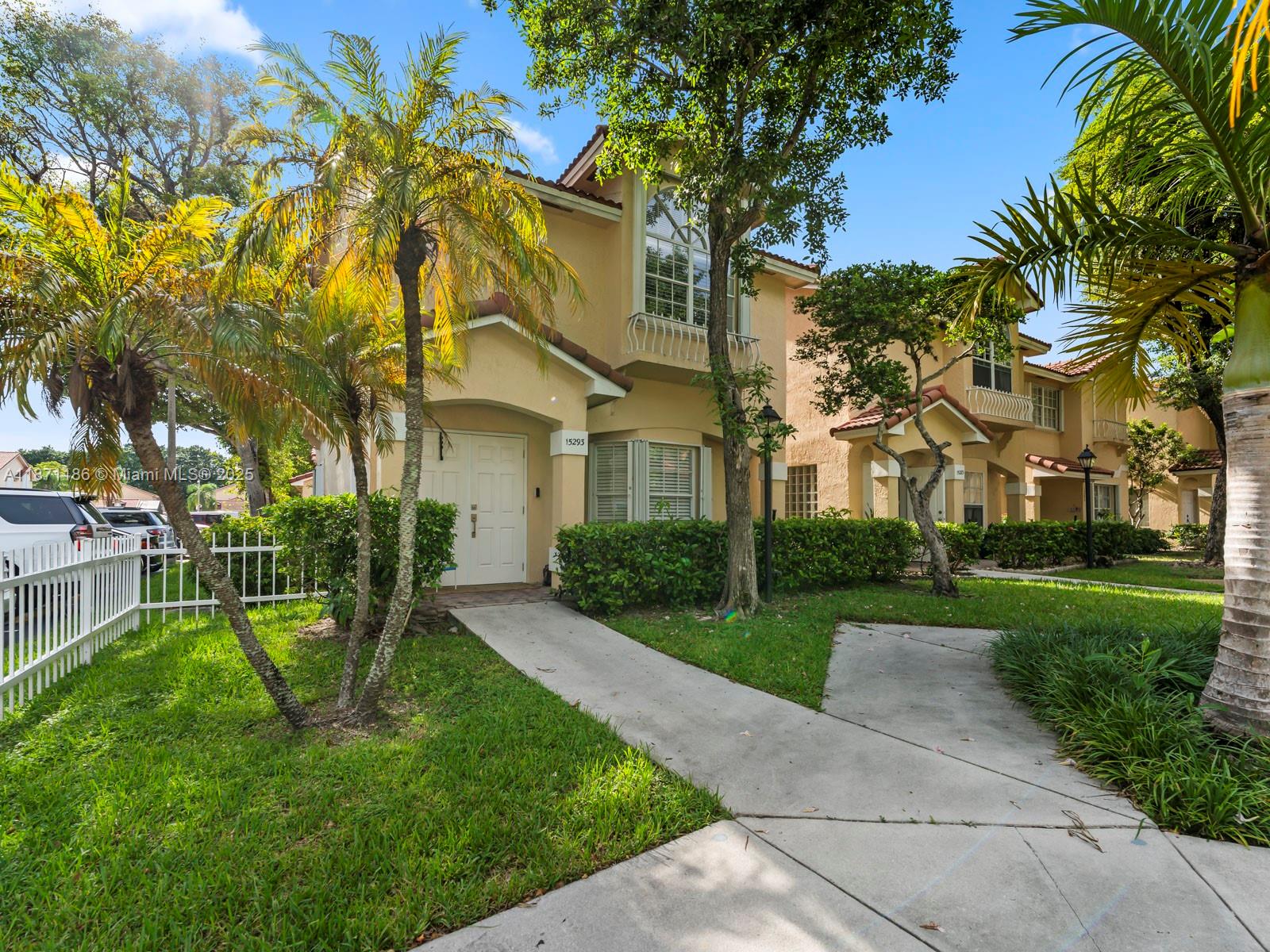 15293 Southwest 111th Street Miami, FL 33196 - Photo 10 of 32 a view of a yard in front of house