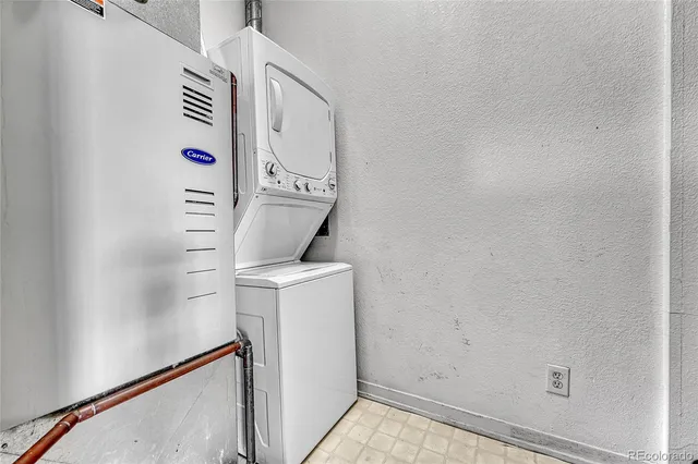 a view of a room with window and wooden floor