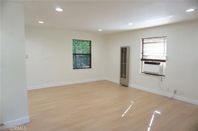 an empty room with windows