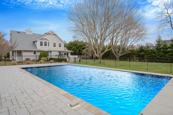 a view of a house with a swimming pool