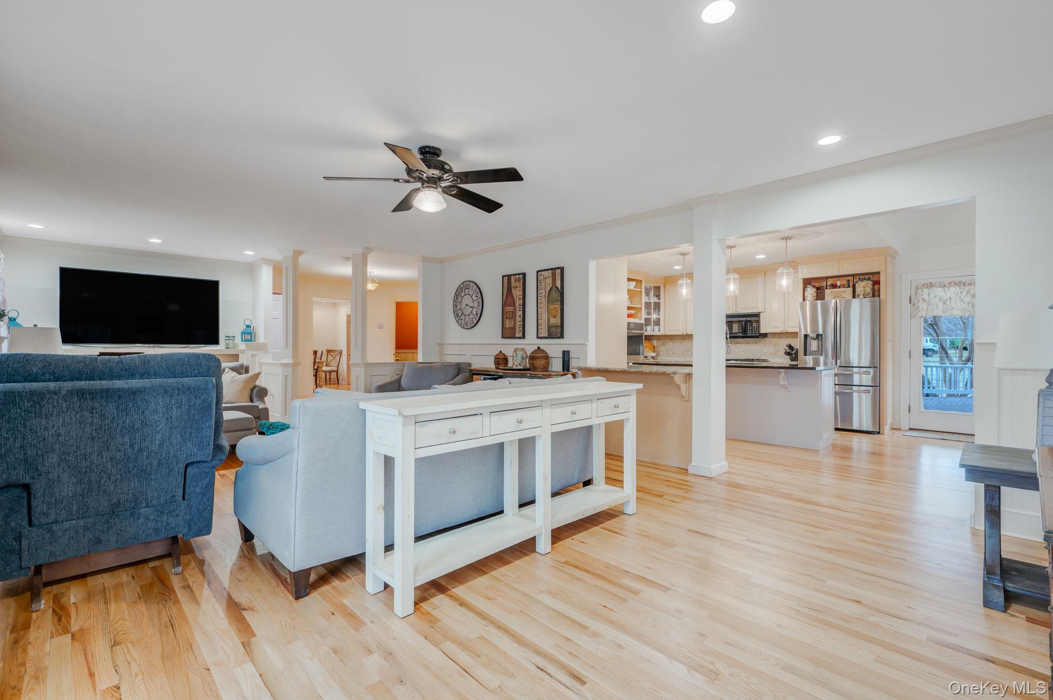 300 Private Road, Unit 8 Cutchogue, NY 11935 - Photo 26 of 47 a view of kitchen with cabinets and wooden floor
