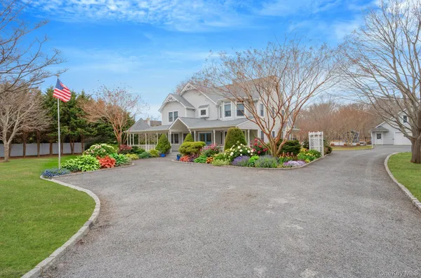 a view of a street with a building in the background