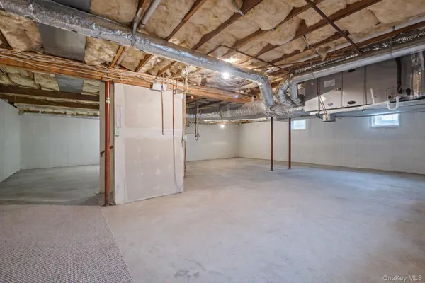 a view of a room with wooden walls