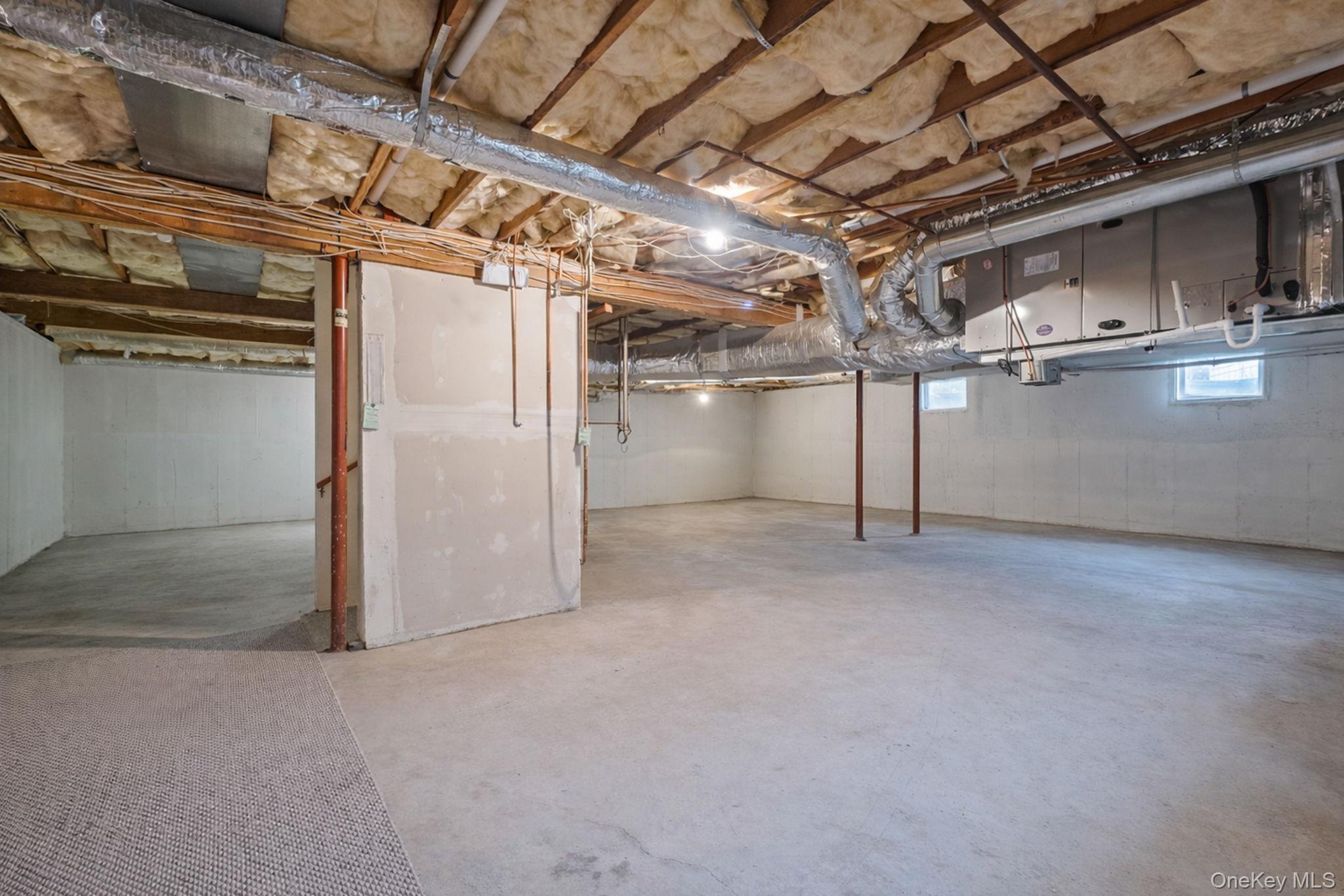 300 Private Road, Unit 8 Cutchogue, NY 11935 - Photo 45 of 47 a view of empty room with wooden floor