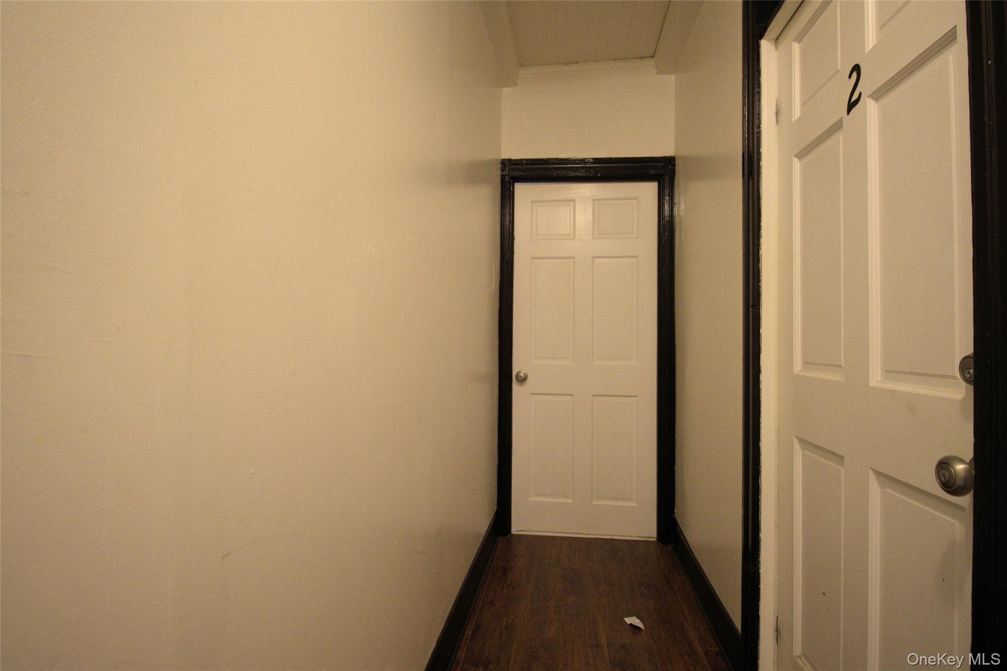 9 Spring Street Liberty, NY 12754 - Photo 14 of 29 Hallway featuring wood-finish flooring and light-toned walls