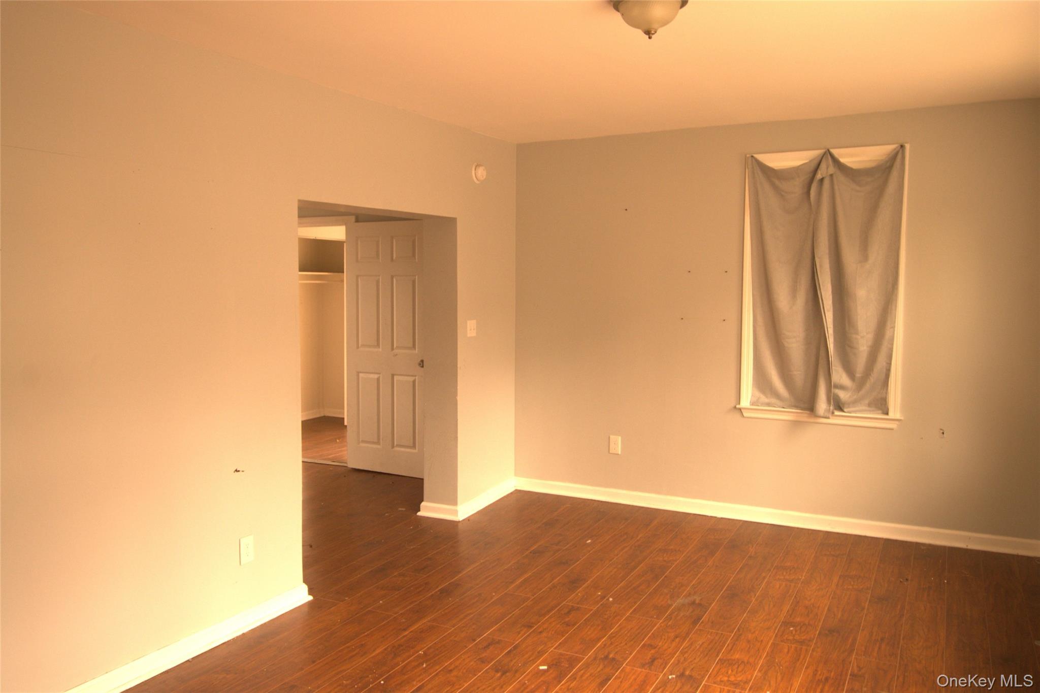 9 Spring Street Liberty, NY 12754 - Photo 27 of 29 Interior room featuring wood-finish flooring and light-toned walls