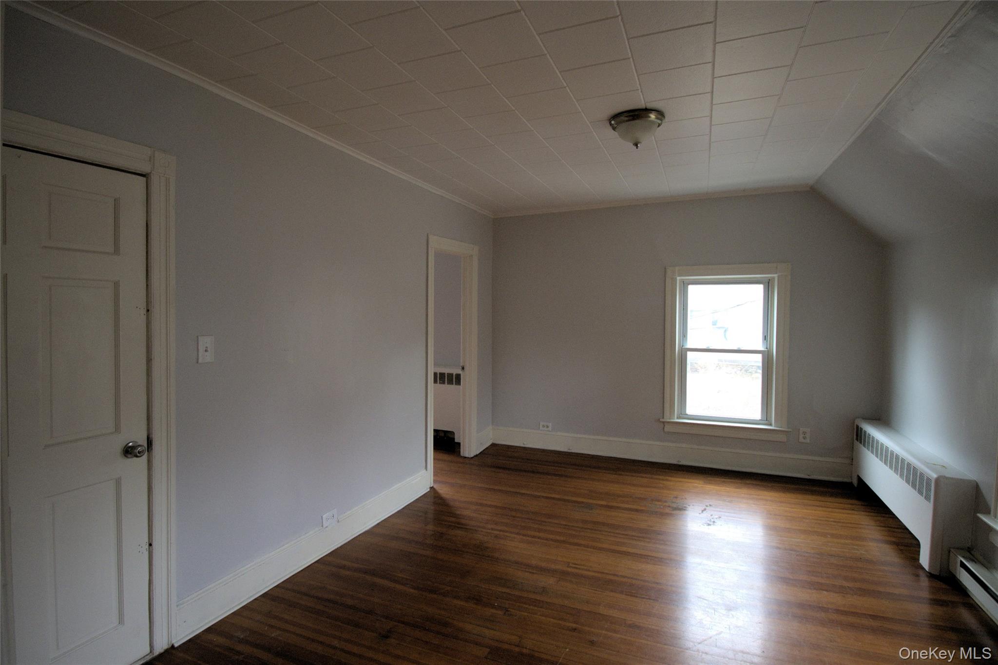 9 Spring Street Liberty, NY 12754 - Photo 10 of 29 Wood-finish flooring with baseboard trim